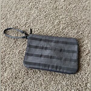 Gray wristlet with sequins